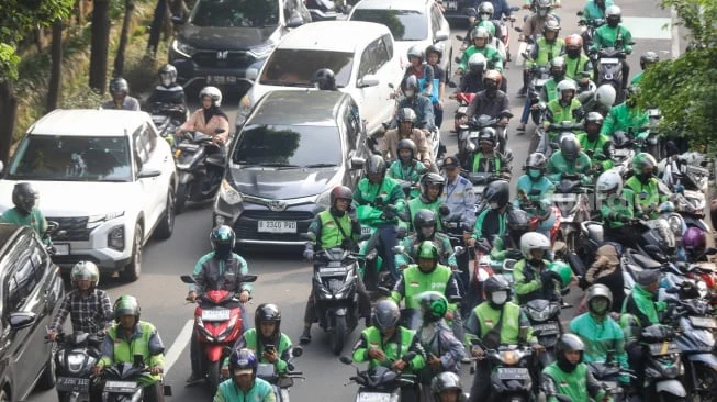 Komisi Ojol Turun Jadi 8 Persen Mulai Berlaku, Apakah Pendapatan Driver Naik dan Tarif Penumpang Berubah?